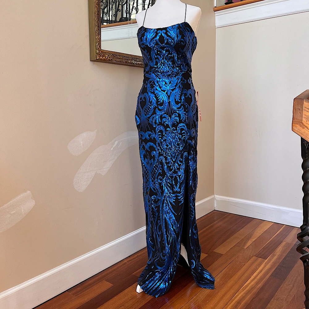 Gorgeous brand new black dress with blue sequins, size 9/10 Prom party dress.